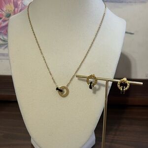GP SS black and gold interlocking Roman numeral necklace and earrings set